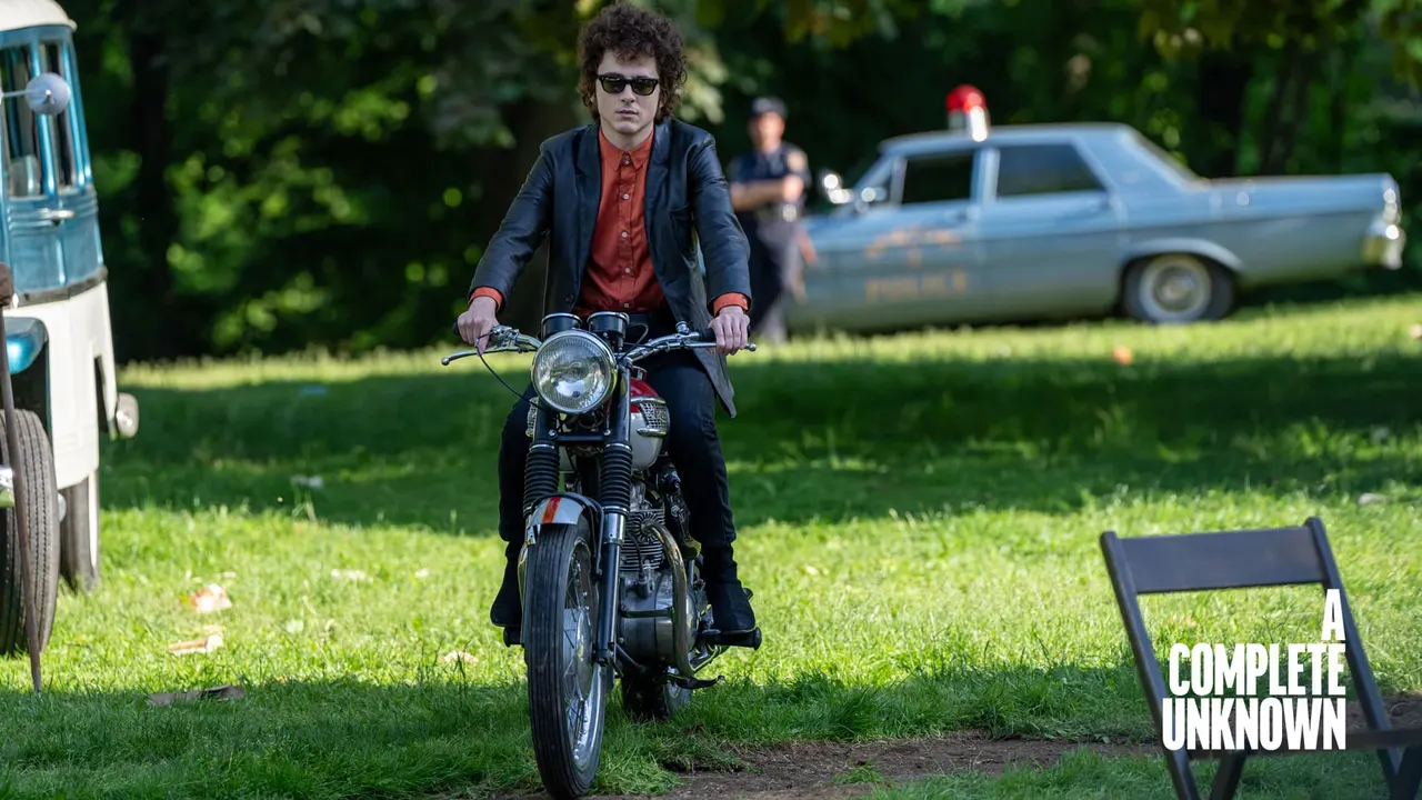 Timothée Chalamet riding a 1960's Triumph Bonneville on set of A COMPLETE UNKNOWN