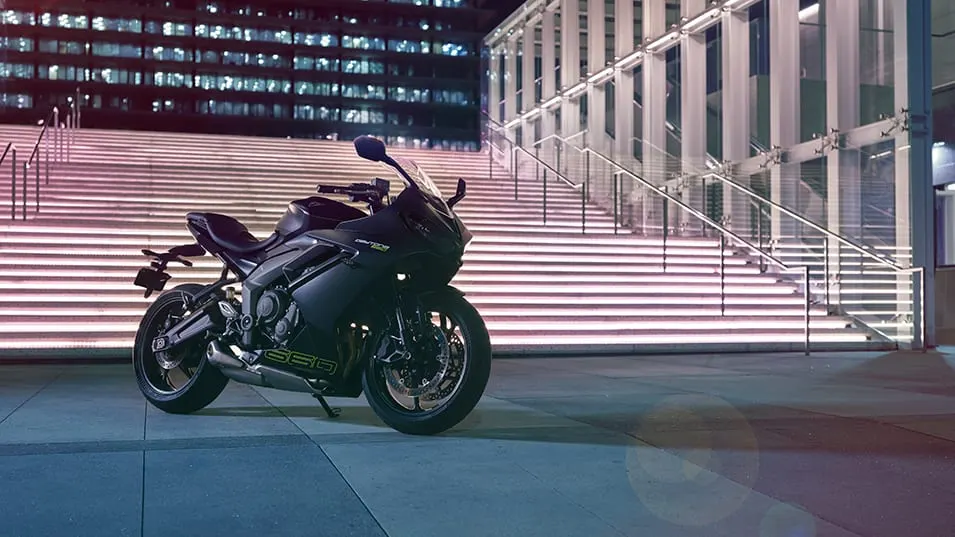 Triumph Daytona 660 in satin granite and satin jet black in urban location